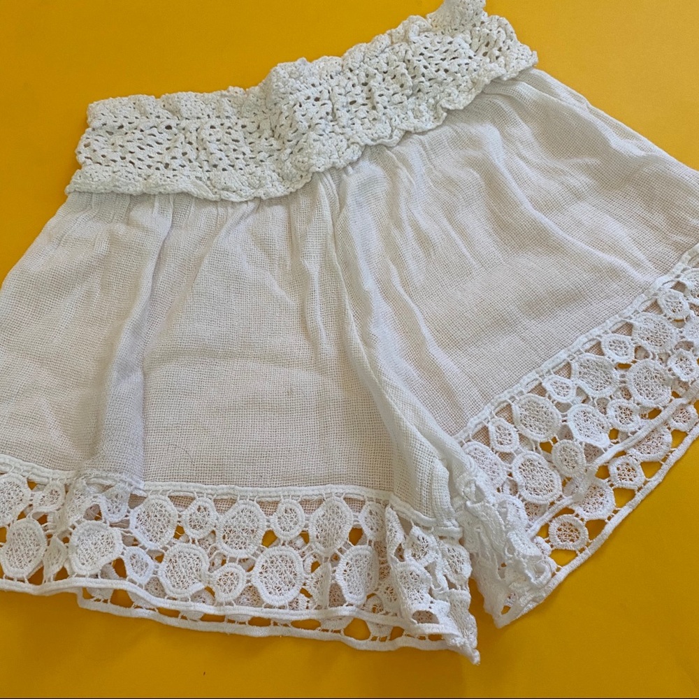 100% linen, lace trim pants in size small.